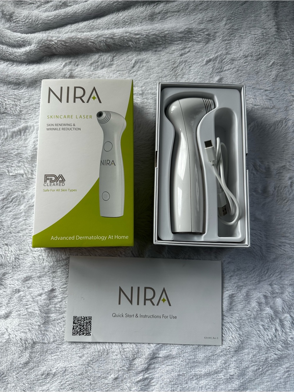 NIRA Skincare Laser Device - White